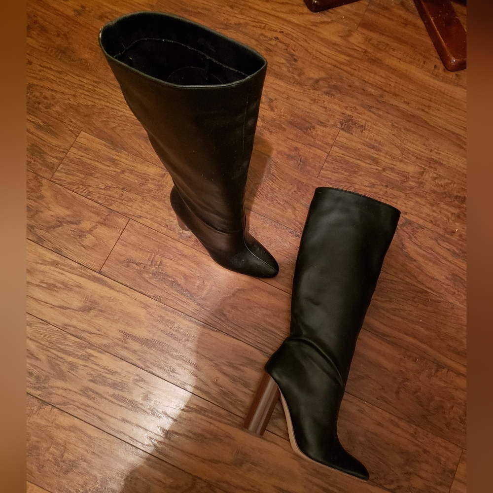 Black knee high boot (worn once)